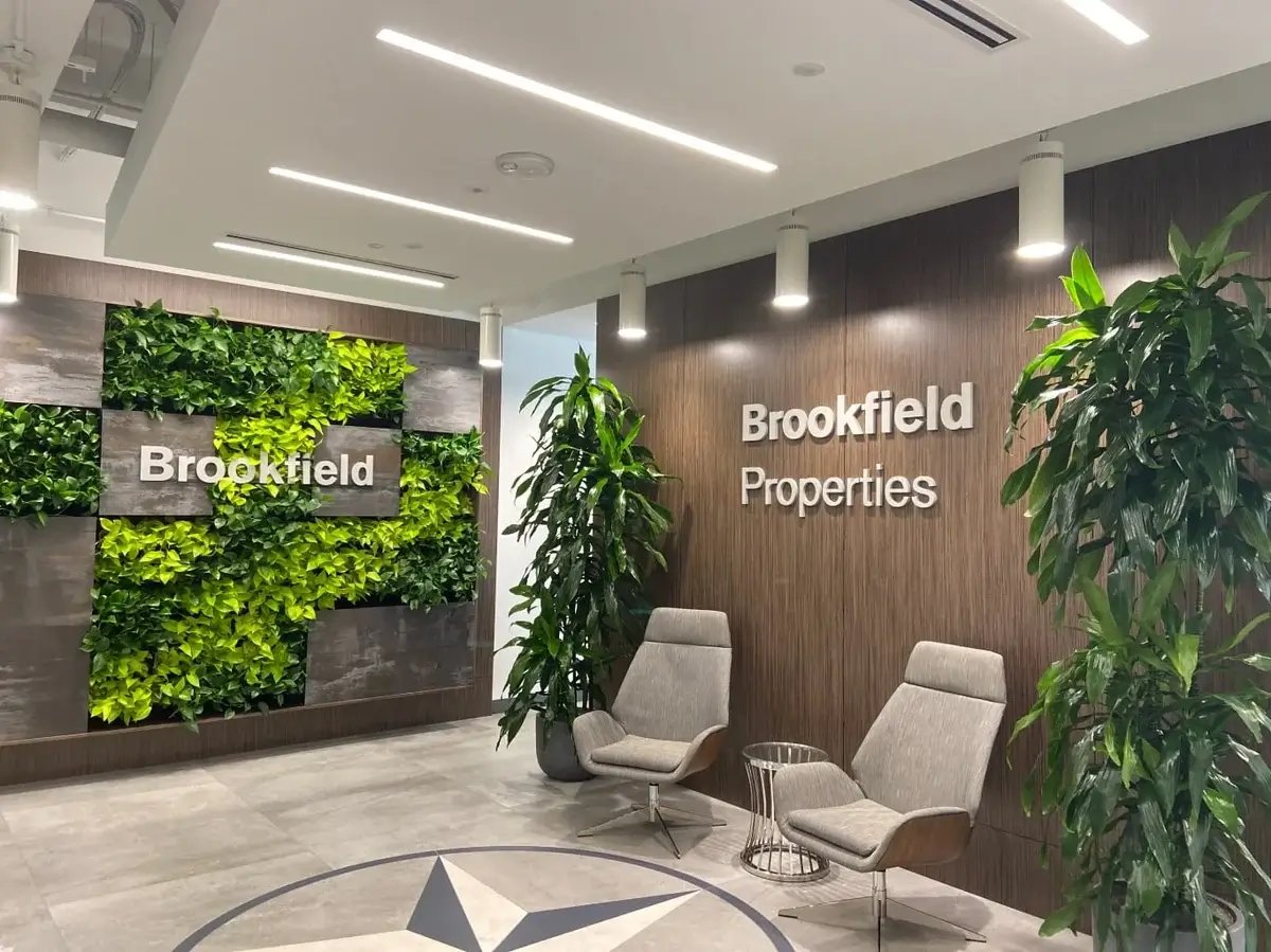 multiple square living walls in office lobby
